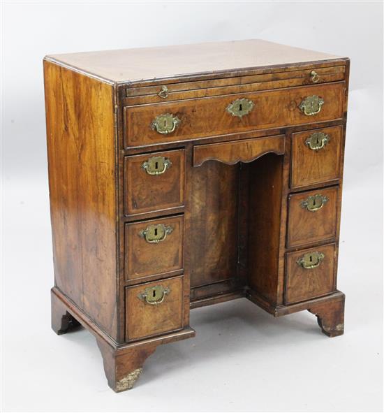A George I walnut caddy top kneehole desk, W.2ft 4in. D.1ft 6in. H.2ft 7in.